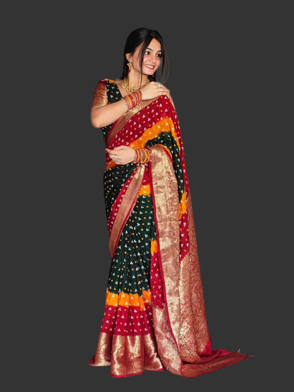 Woman wearing a colorful saree in a living room setting